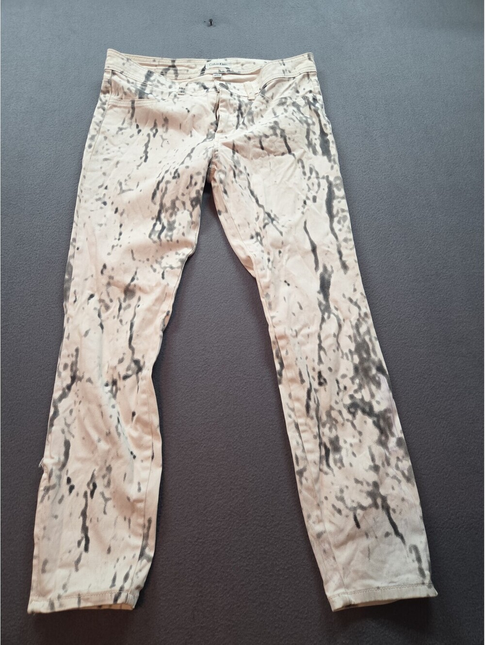 women's white marbled denim jeans by Calvin Klein size 4